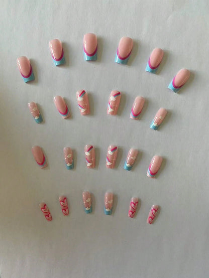 18546 1b-068 Uñas postizas color rosa con líneas azul 24 Pzas