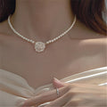17142 1b-013 Collar de perlas dije de flor 1 Pza