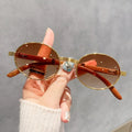 13628 1l-392 Gafas de sol ovaladas 1 Pza