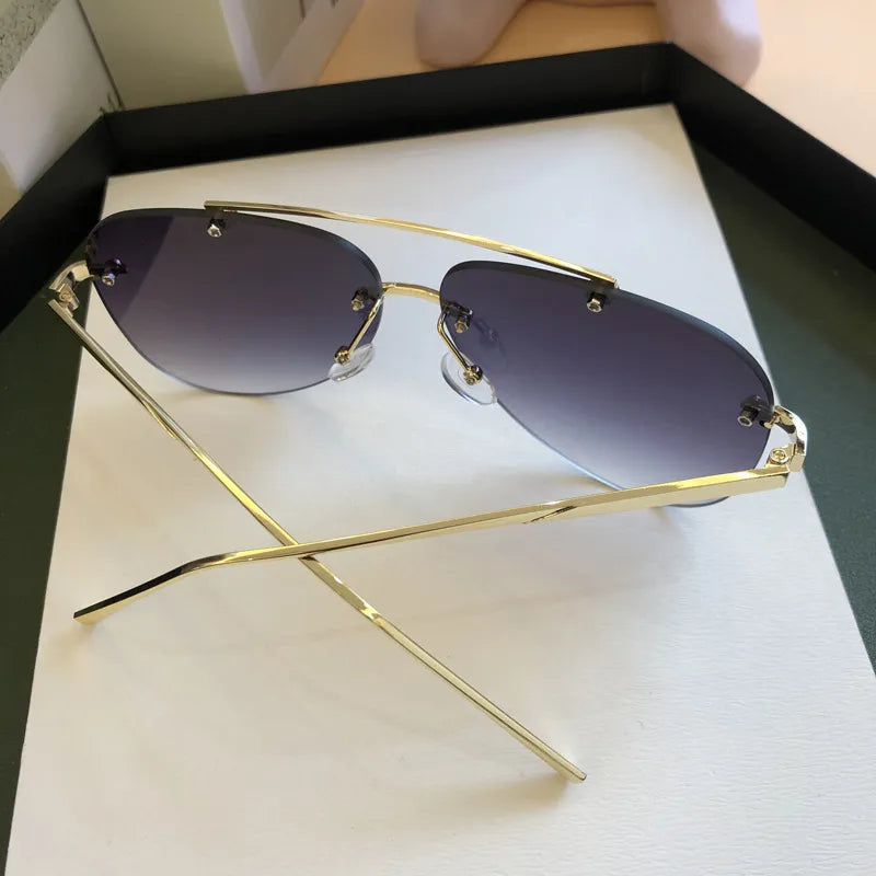 8849 a09-06 Gafas de sol Vintage de aleación sin montura para hombre y mujer