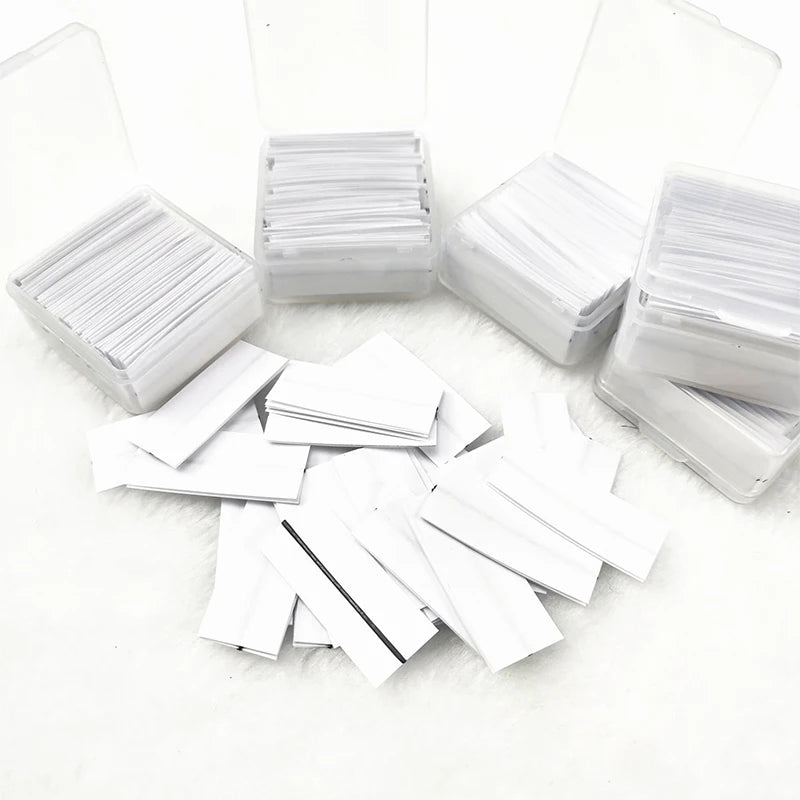 10435 1b-150 Tira de 150 UNIDADES  pegamento para pestañas postizas,