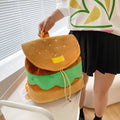 15044 1c-03-08  Mochila con diseño de hamburguesa 1 Pza