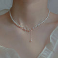 17124 1b-002 Collar de perlas diseño mariposa 1 Pza