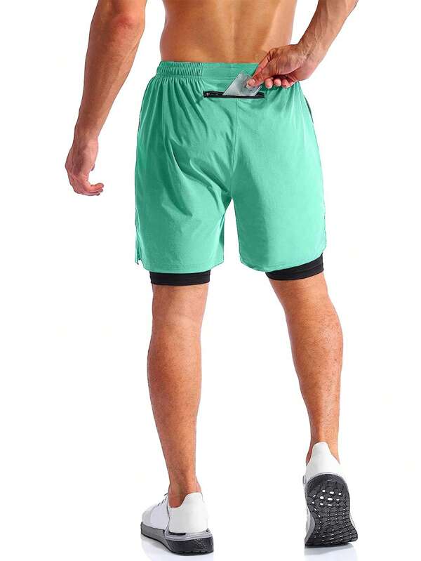 x193 t01 Shorts deportivos de cintura con cordón bajo con abertura 2 en 1 con bolsillo para teléfono